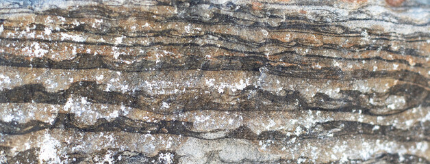 Layers of stone. Stone with brown stripes