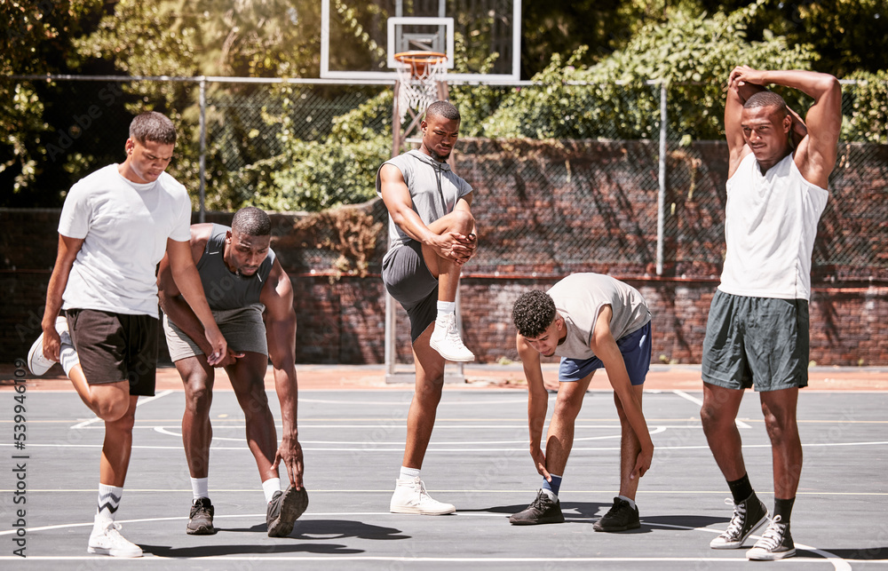 Wall mural Fitness, exercise and basketball men stretching or workout their body on a sport court. Training male athletes prepare muscle warm up before practice or game at a sports venue or club for health