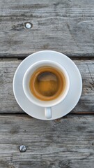cup of coffee on wooden table