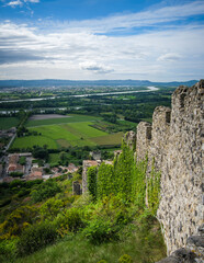 Obraz premium View on the medieval fortification of Rochemaure village, the countryside and the Rhone river valley in the South of France (Ardeche)