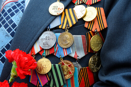 Medals and orders of the Soviet Union on costume of a veteran of the World War II. Celebration of Victory Day