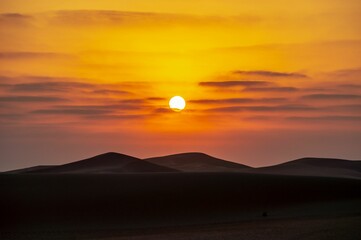 Scenic view of sunset over Liwa Desert in the United Arab Emirates