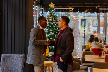Meeting for the first time in the cafe while standing