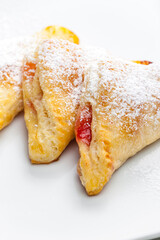 homemade puff pastry filled with strawberry jam