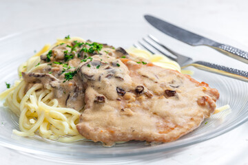 pork filet with mushroom sauce served with spatzles