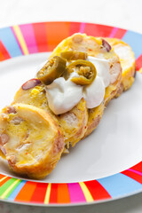 bean dumplings with sour cream and jalapenos