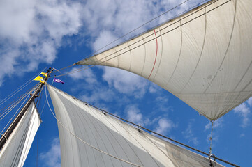 Mast and rigging of an old sailing ship photographed upwards into the sky