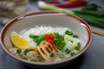 pho soup with chicken meat and vegetables