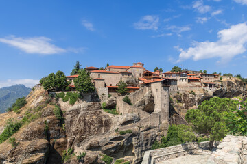 Fototapeta na wymiar Panoramic view over largest religious complex in Meteora - Great Meteoron or Holy Monastery of Transfiguration of Christ. Meteora, Greece.