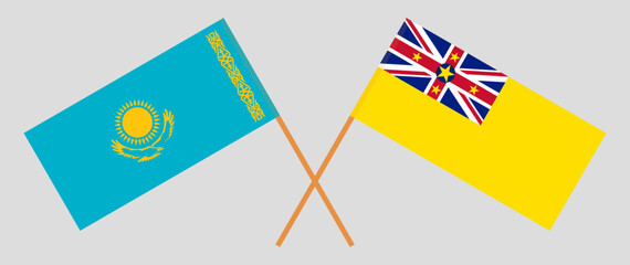 Crossed flags of Kazakhstan and Niue. Official colors. Correct proportion