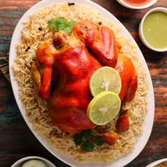 Arabic chicken Manthi or mandi cooked meat, Basmati rice with Masala, spice. Kuzhimanthi or hot and...