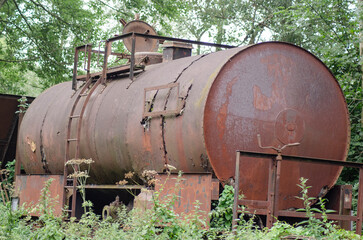 Naklejka premium Old railway wagon on a track