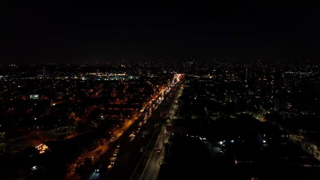 Aerial view of iconic Panamerican Highway at night, Santiago cityscape. Chile