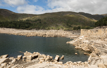 General view of Vilarinho da Furna old village, Portugal. Submerged since 1971 because of the dam construction, emerged due to the current drought in this region - September 2022