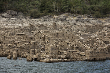 Abandoned old village of Vilarinho da Furna, Portugal. Submerged since 1971 because of the dam construction, emerged due to the current drought in this region - September 2022
