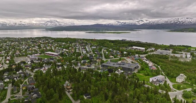 Troms&oslash; Norway Aerial v6 drone flyover elverh&oslash;y and stalheim residential neighborhoods, overlooking at mountain landscape across the fjord at daytime - Shot with Mavic 3 Cine - June 2022