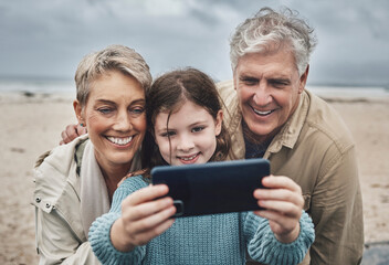 Phone selfie, beach and grandparents with child bond on relax adventure, fun travel journey or...