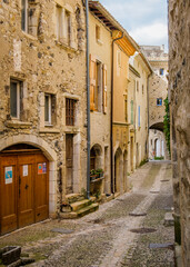 Medieval houses and cobblestone street in the village of Rochemaure, in the South of France...