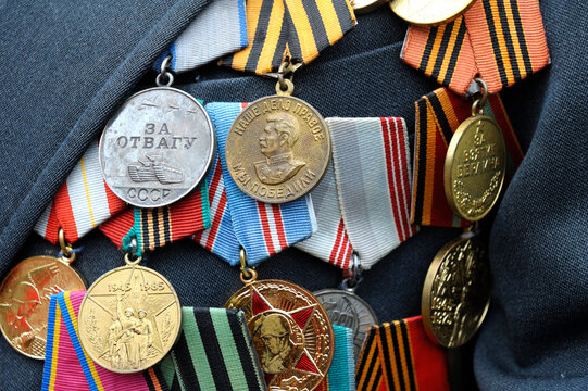 Medals and orders of the Soviet Union on costume of a veteran of the World War II. Celebration of Victory Day. Kyiv, Ukraine
