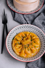 dumplings Khinkali on a plate in restaurant