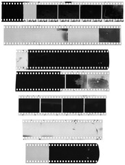 Old, used, dusty and scratched celluloid film strips on transparent background - 539969152
