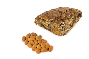 Bread with almonds and various seeds isolated on a white background.