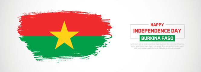 Abstract flag of Burkina Faso on hand drawn brush strokes. Happy Independence Day with grunge style vector background