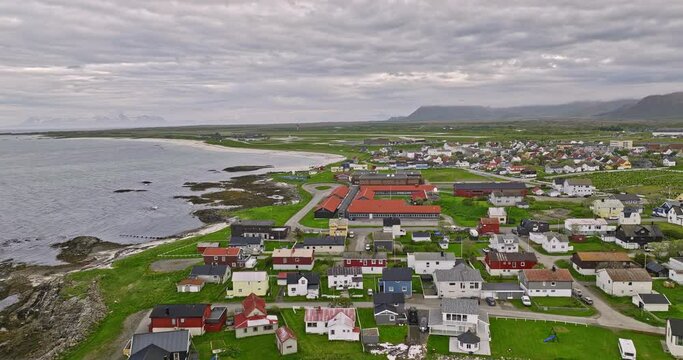 Andenes Norway v2 cinematic low level flyover coastal village town center capturing and&oslash;ya airport, residential neighborhood and local schools on an idyllic day - Shot with Mavic 3 Cine - June 2022