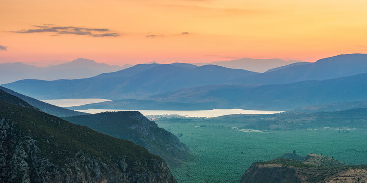 View over the Pleistos River Valley towards the Gulf of Corinth at dusk, Delphi, Phocis