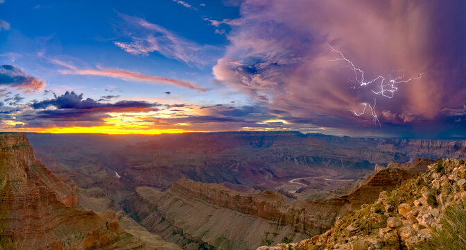 A dying storm at twilight viewed from Lipan Point, Grand Canyon, with Spider Lightning visible, Grand Canyon National Park, UNESCO World Heritage Site, Arizona