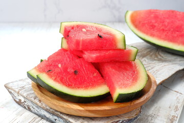 Fresh ripe sliced watermelon on white background