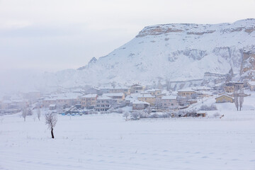 Pigeon Valley and Cave town in Goreme during winter time. Cappadocia, Turkey. 