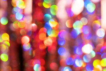 Festive Happy New Year and Merry Christmas background with colorful bright bokeh