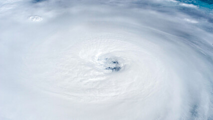 Fototapeta na wymiar The eye of Hurricane Ian. Force of nature and climate change concept. Digital enhancement. Elements by NASA