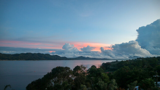 stunning tondano lake surrounded by beautiful hills