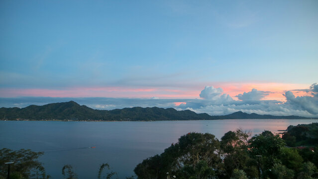 stunning tondano lake surrounded by beautiful hills