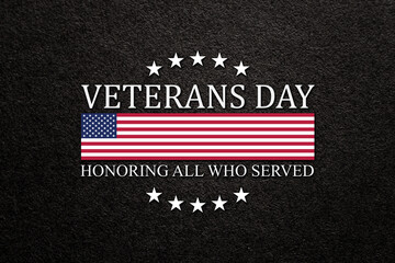 Text Veterans Day Honoring All Who Served on black textured background. American holiday typography poster. Banner, flyer, sticker, greeting card, postcard.