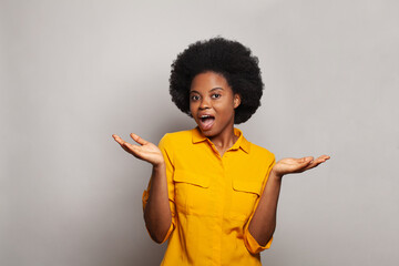 Happy surprised excited woman brunette with empty open hands