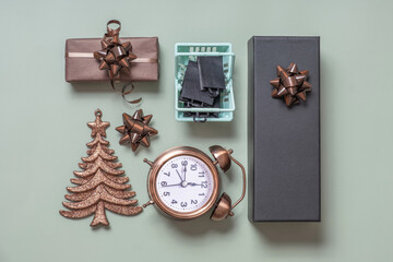 Christmas New Year shopping flatlay with gifts and holiday decor top view. Creative modern layout