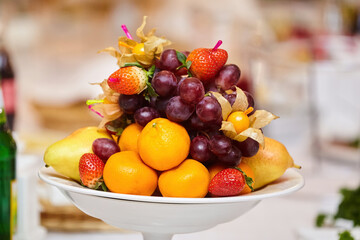 Assorted types of fruits. Serving fruit for the holiday table.