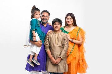 Happy indian family standing on white background.