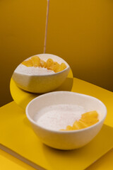 porridge with pineapple on a yellow background