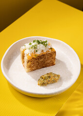 casserole with vegetables on a yellow background
