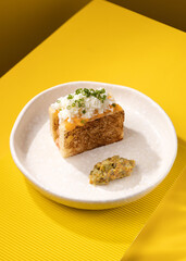 casserole with vegetables on a yellow background