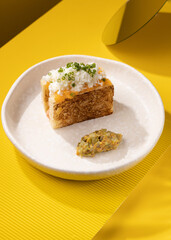 casserole with vegetables on a yellow background