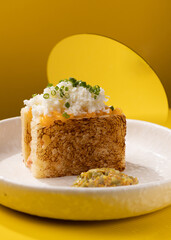casserole with vegetables on a yellow background