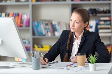 Young business woman manager working in office.  Business ideas concept.