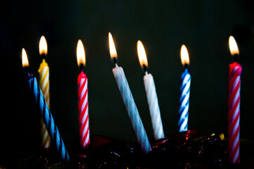 birthday candles on black background