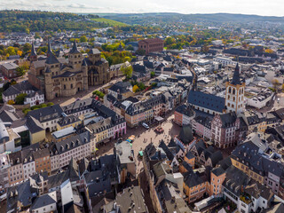 Obraz premium Aerial Drone Shot of the City Center in Trier, Rheinland-Pfalz. Autumn day in Famous German city