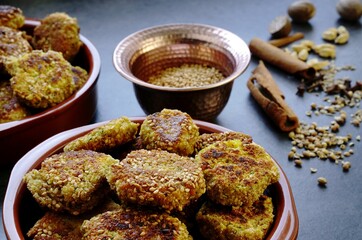 Vegan food: Fried falafel balls with sesame and oriental spices - 540003335